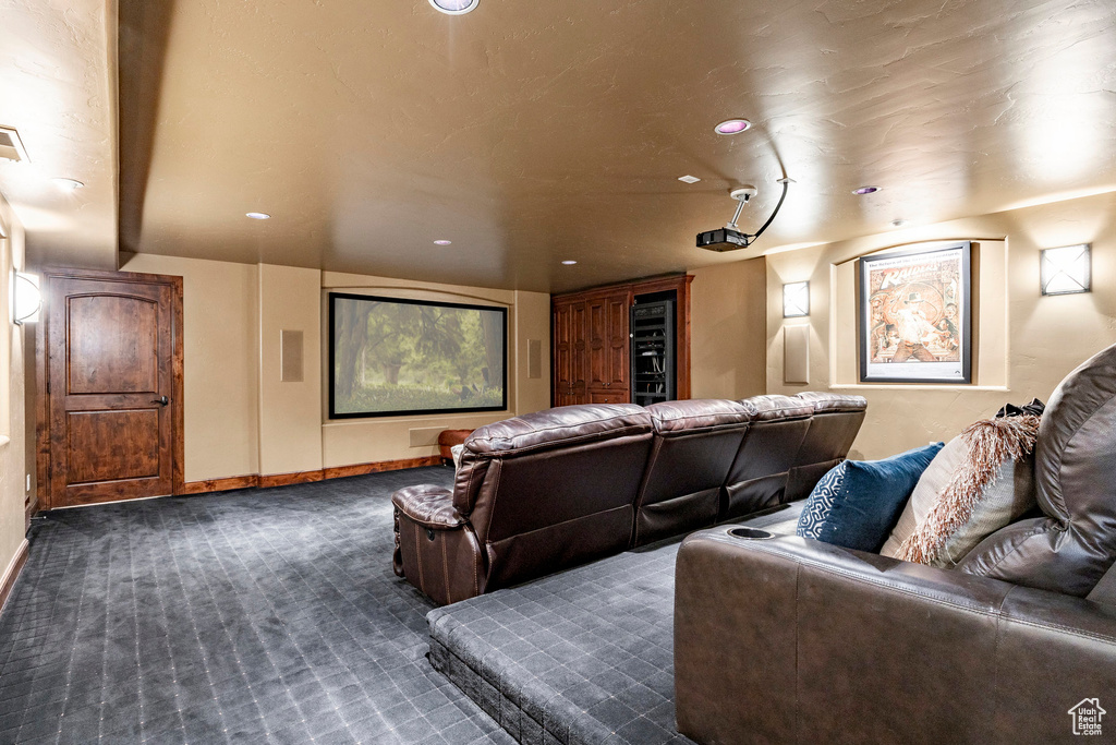 Cinema room with carpet floors, baseboards, recessed lighting, and visible vents