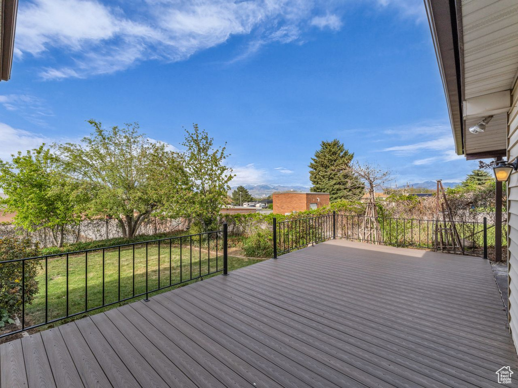 Wooden terrace with a yard