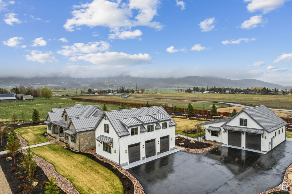 Drone / aerial view featuring a mountain view and a rural view