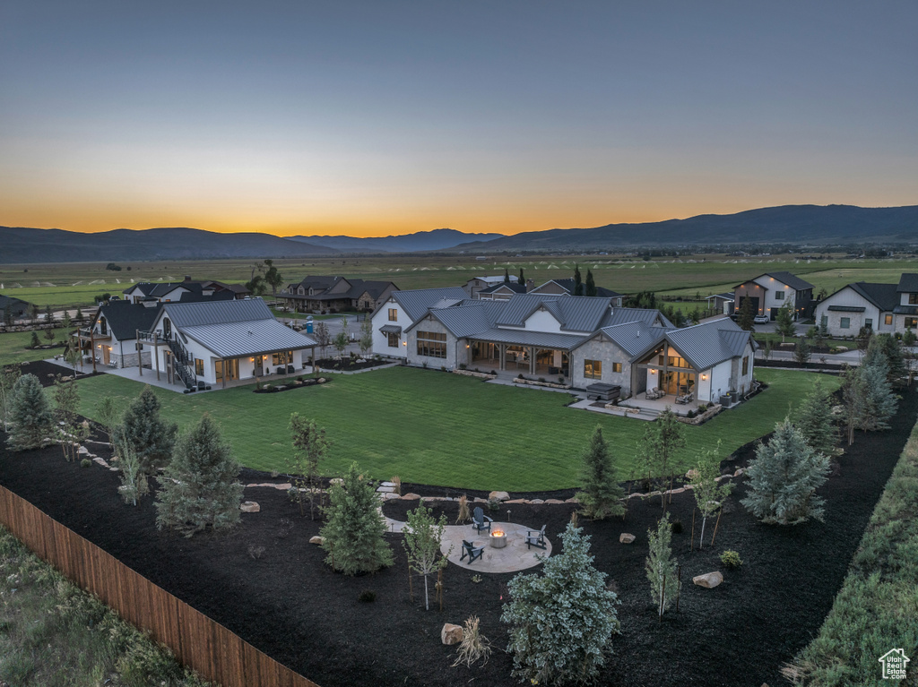 Birds eye view of property with a mountain view