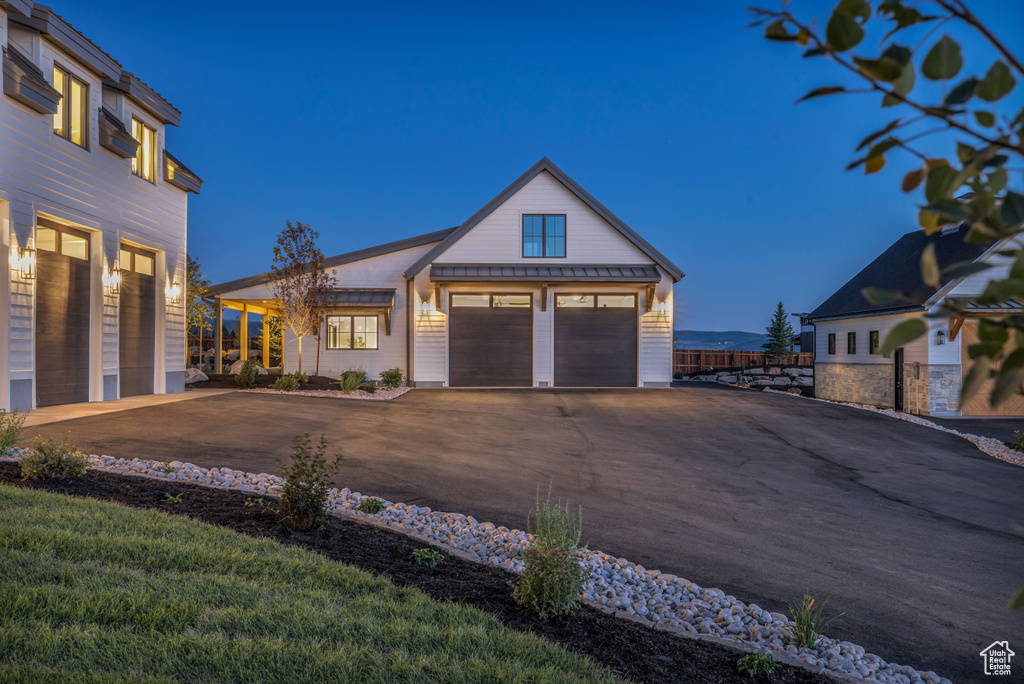 View of front of home with a standing seam roof