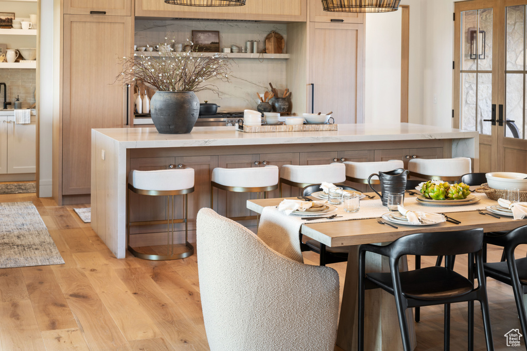 Dining room with light wood-type flooring