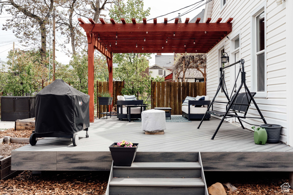 Wooden deck with fence, a pergola, an outdoor living space, and a grill