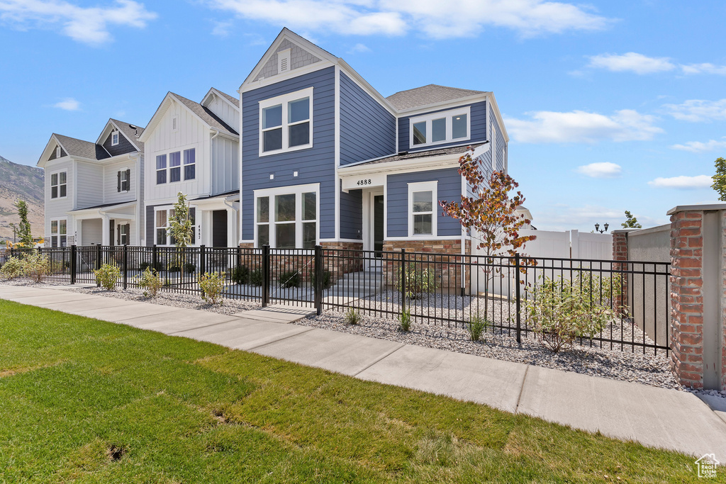 View of front of house featuring board and batten siding