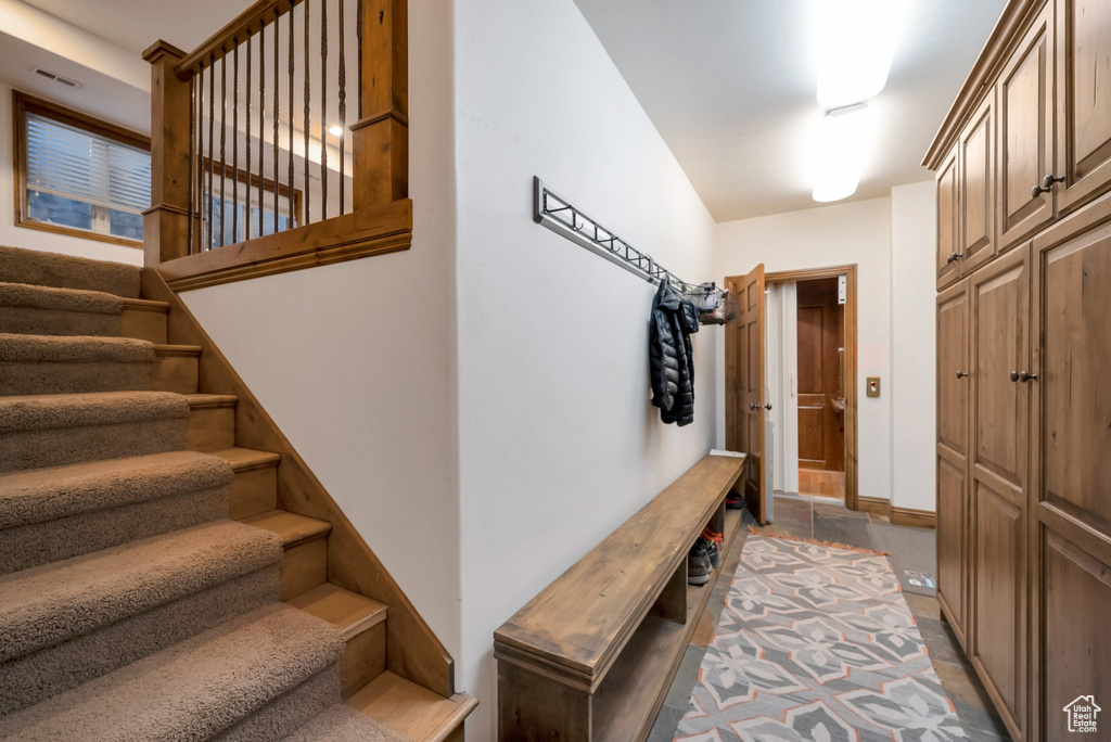 Mudroom featuring baseboards