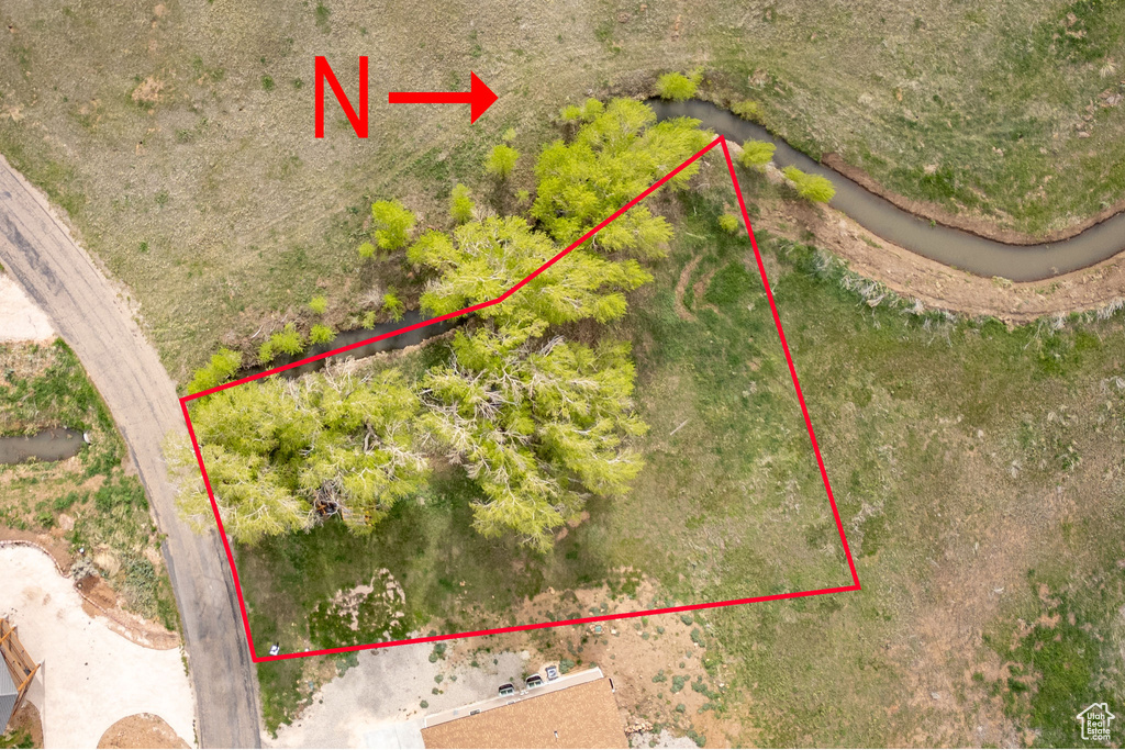 Aerial overview of property's location with property boundaries highlighted