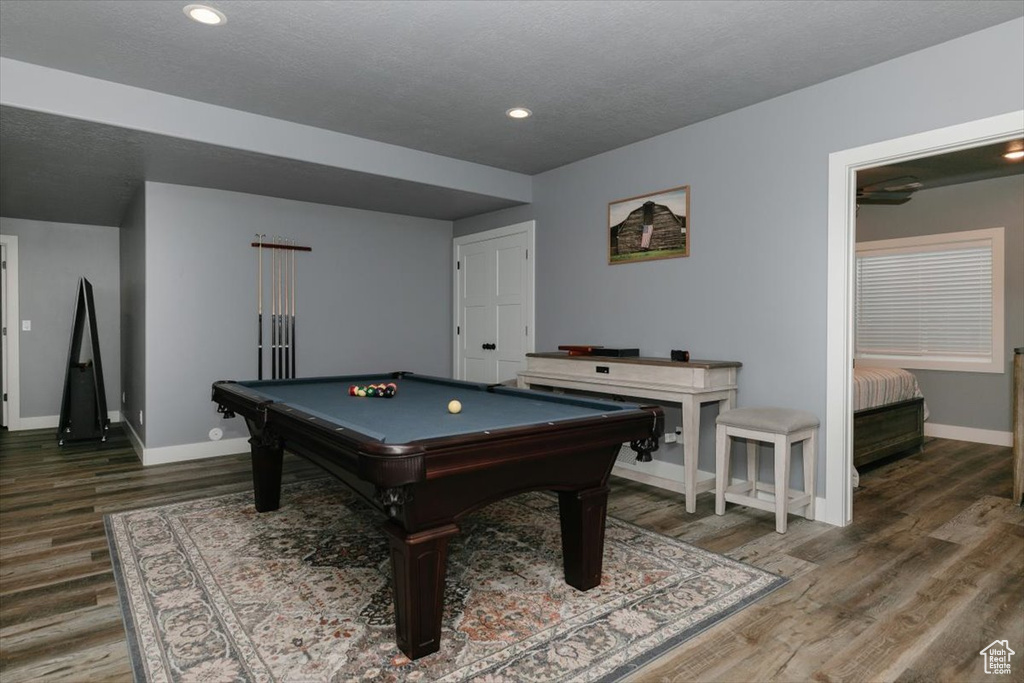 Game room featuring wood finished floors, baseboards, billiards, and recessed lighting