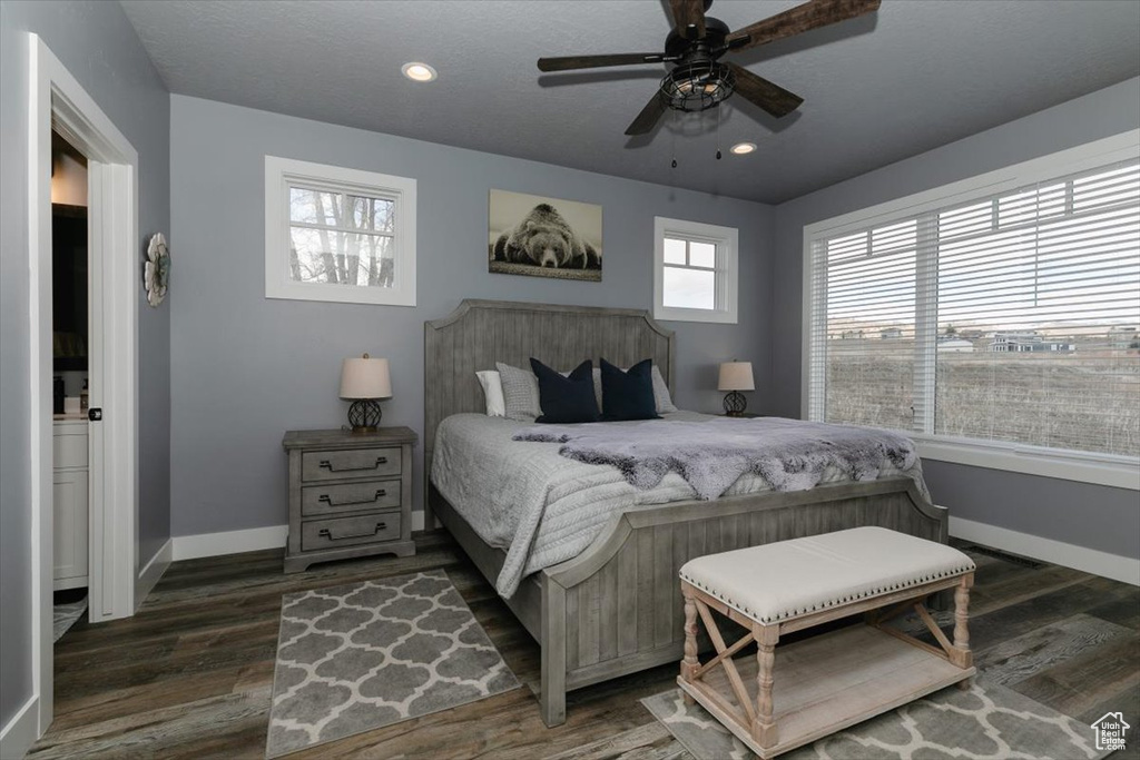 Bedroom with recessed lighting, ceiling fan, baseboards, and wood finished floors
