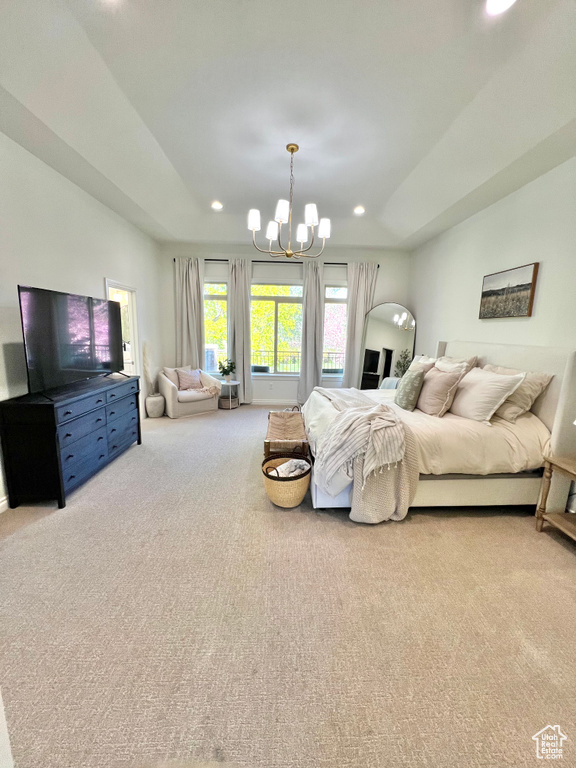 Bedroom featuring recessed lighting, a notable chandelier, and carpet