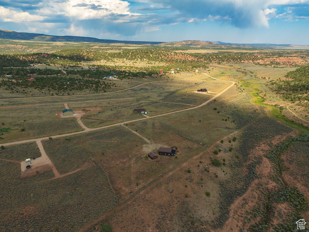 Birds eye view of property featuring a rural view and a mountain view