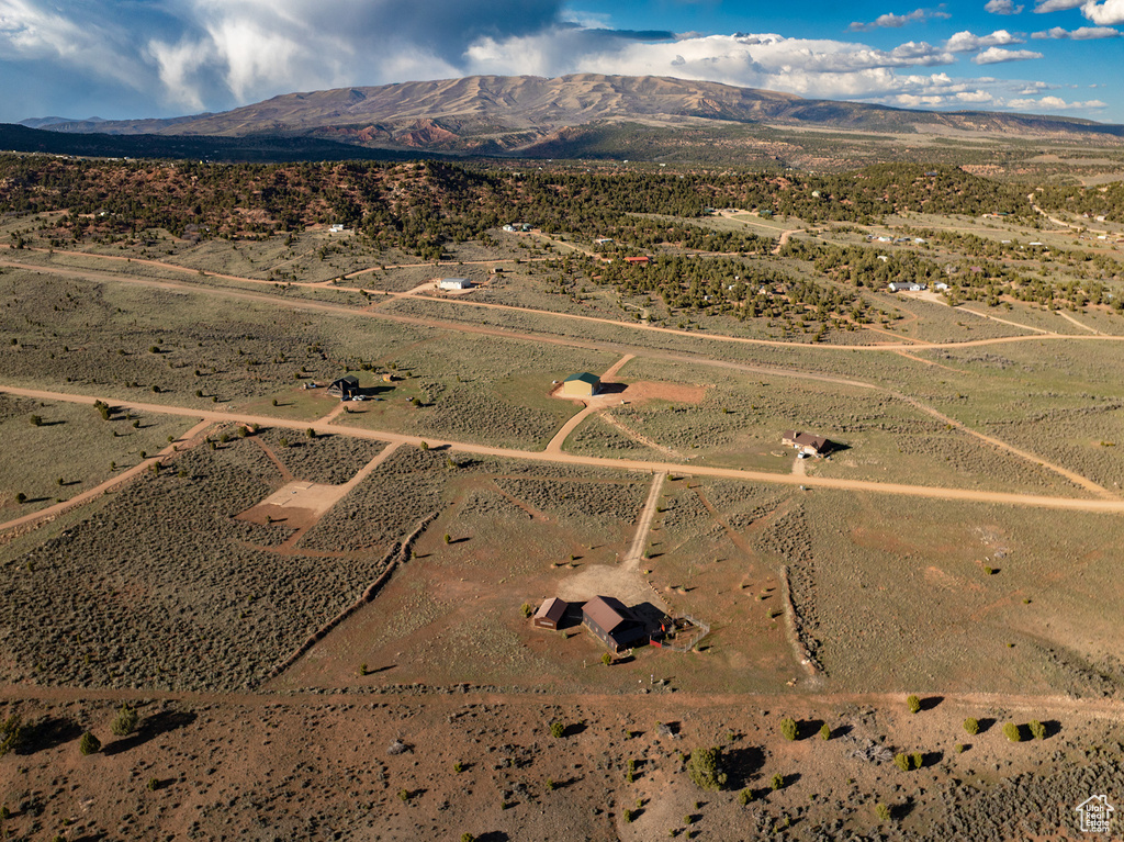 Aerial view featuring a rural view and a mountain view