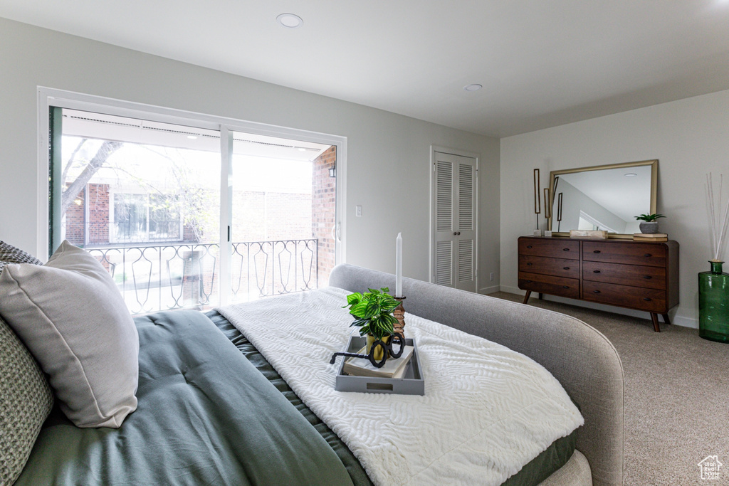 Bedroom featuring carpet floors, baseboards, access to outside, and recessed lighting