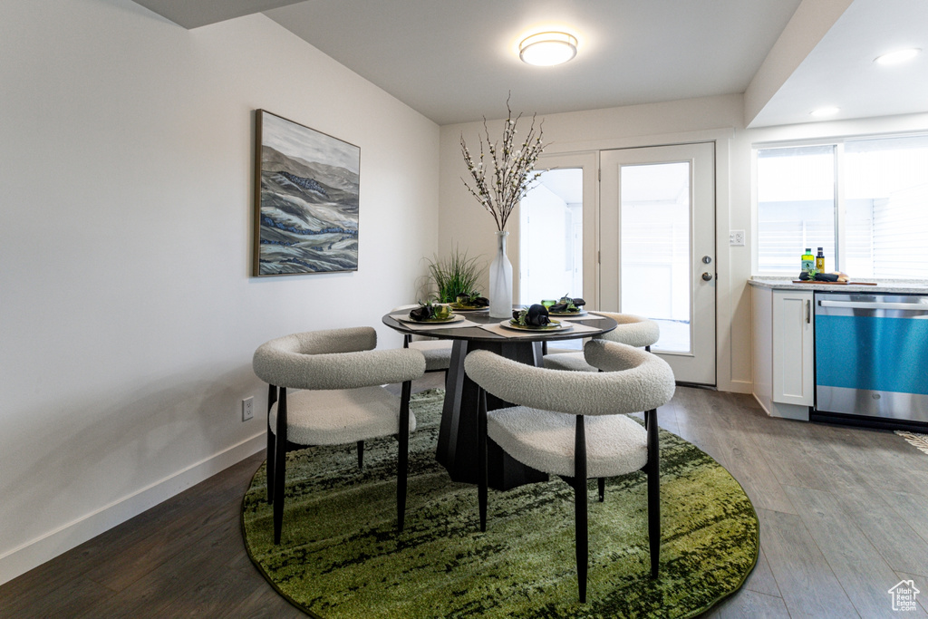 Dining area featuring baseboards and wood finished floors