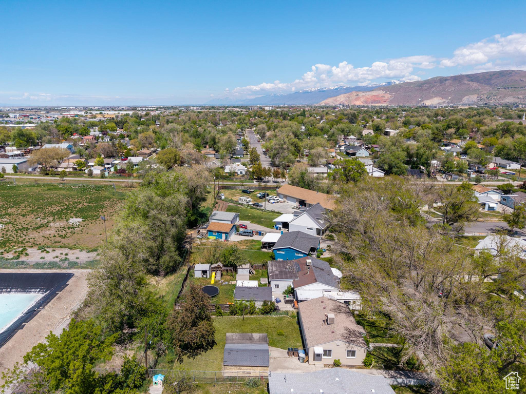 Drone / aerial view with a residential view and a mountain view
