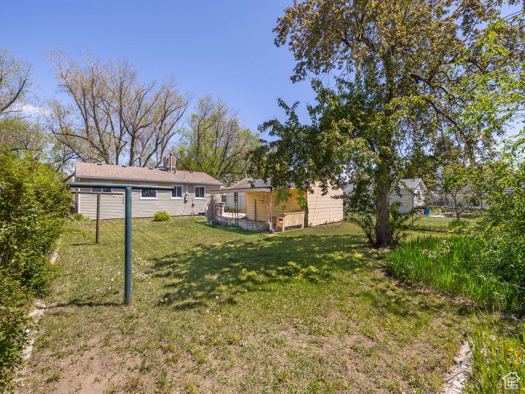 View of yard with fence
