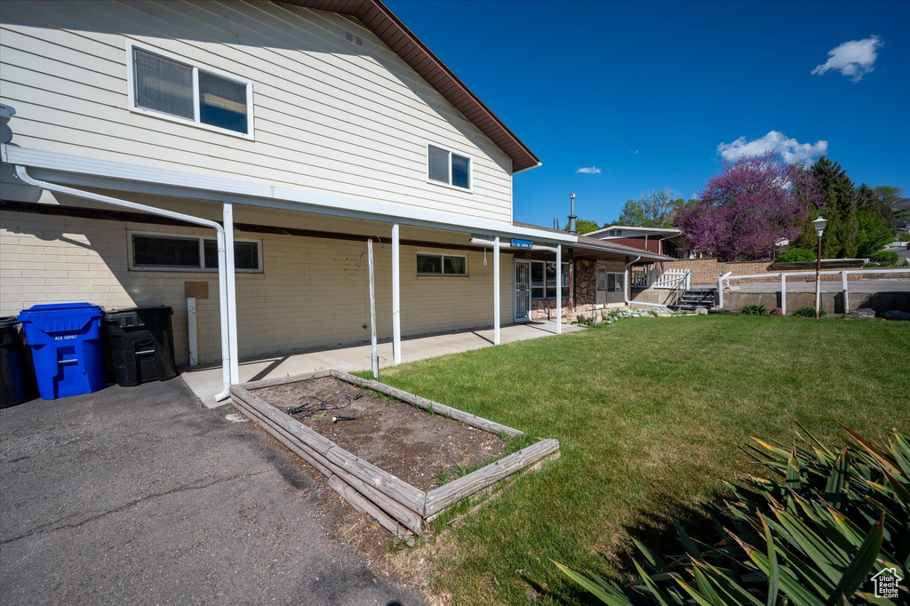 View of yard featuring a patio
