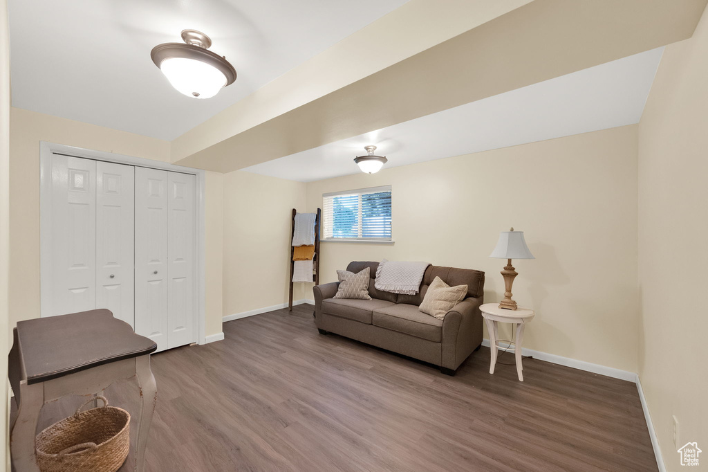Living area featuring wood finished floors and baseboards