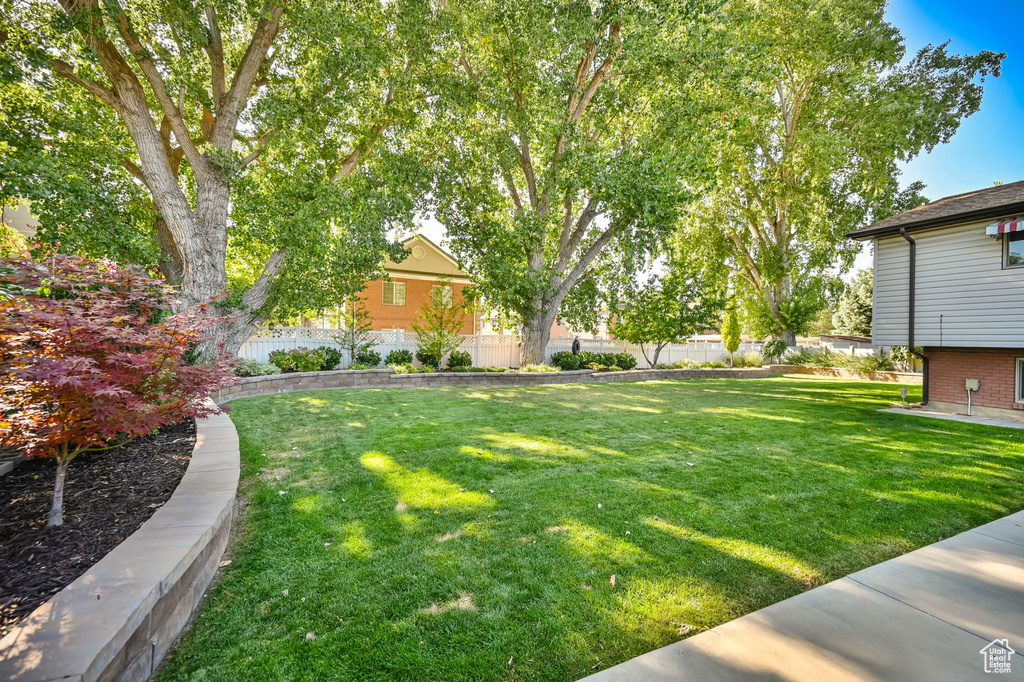 View of yard with fence