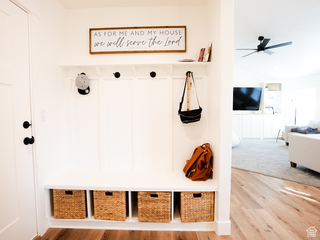 Mudroom featuring a ceiling fan and light wood-type flooring