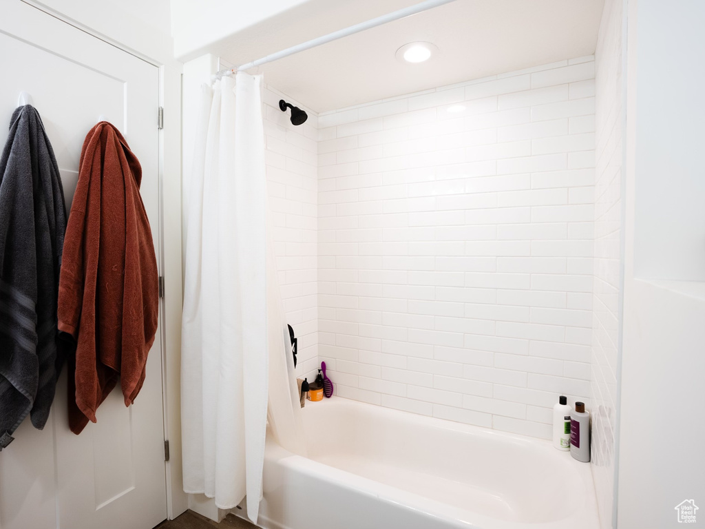Full bath featuring recessed lighting and shower / bath combination with curtain