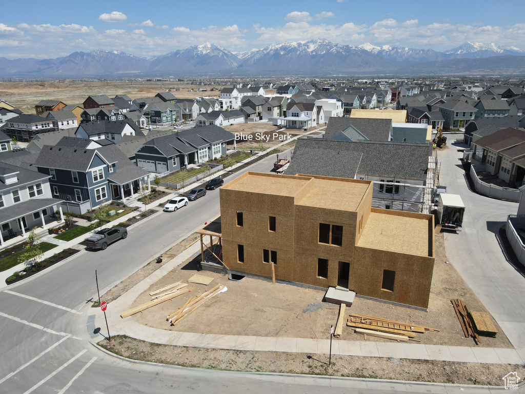 Drone / aerial view featuring a residential view and a mountain view
