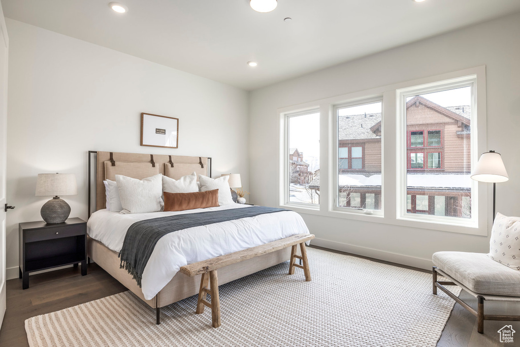 Bedroom with recessed lighting, baseboards, and wood finished floors
