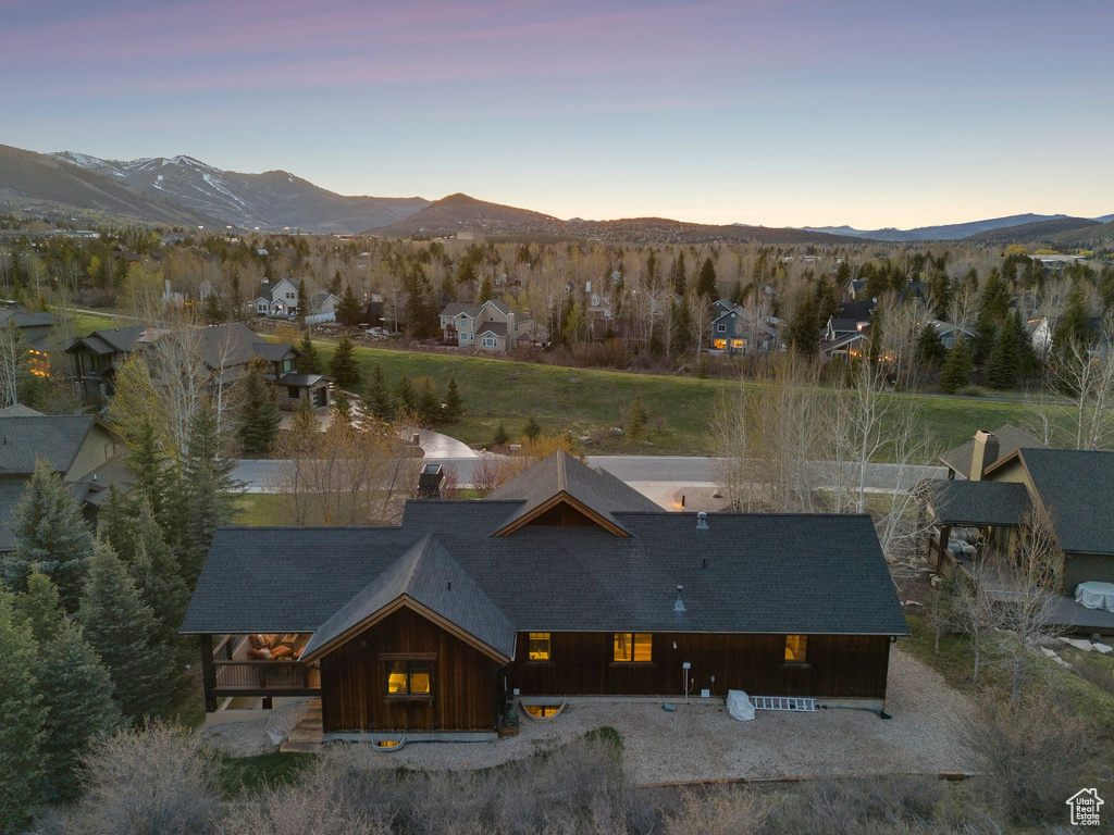 Drone / aerial view with a residential view and a mountain view