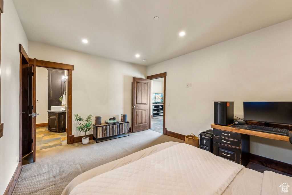 Bedroom with baseboards, light carpet, and recessed lighting