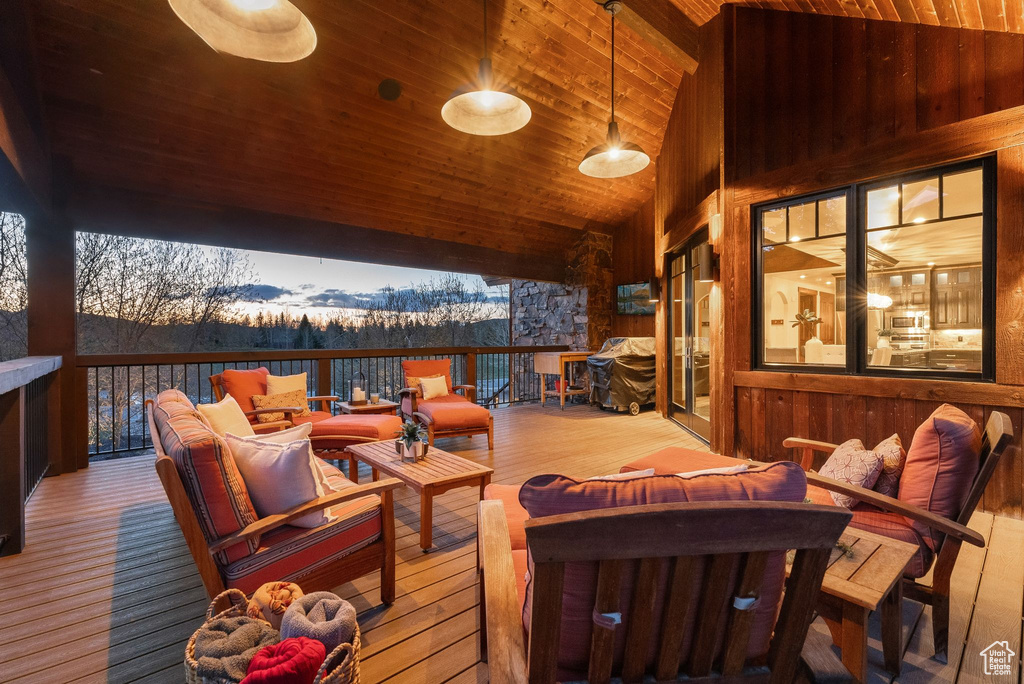 Wooden terrace with an outdoor hangout area