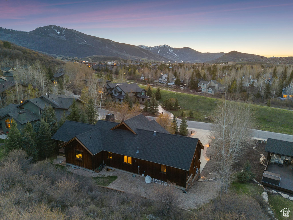 Drone / aerial view featuring a mountain view and a residential view