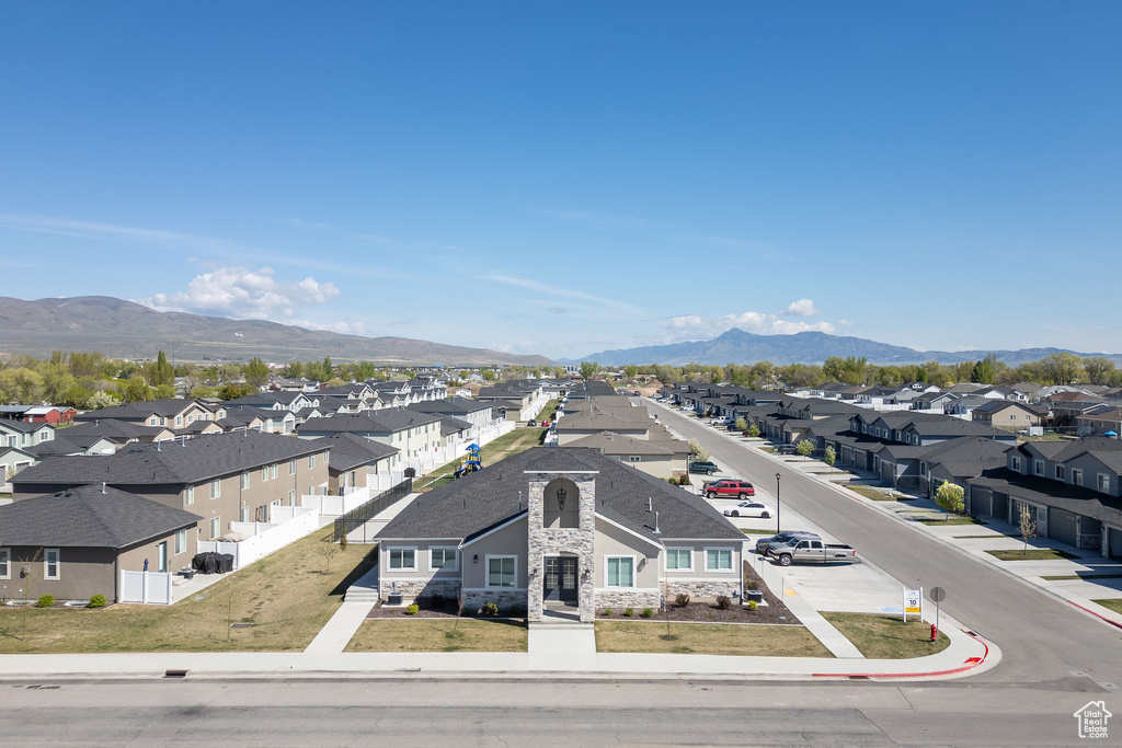 Drone / aerial view with a residential view and a mountain view