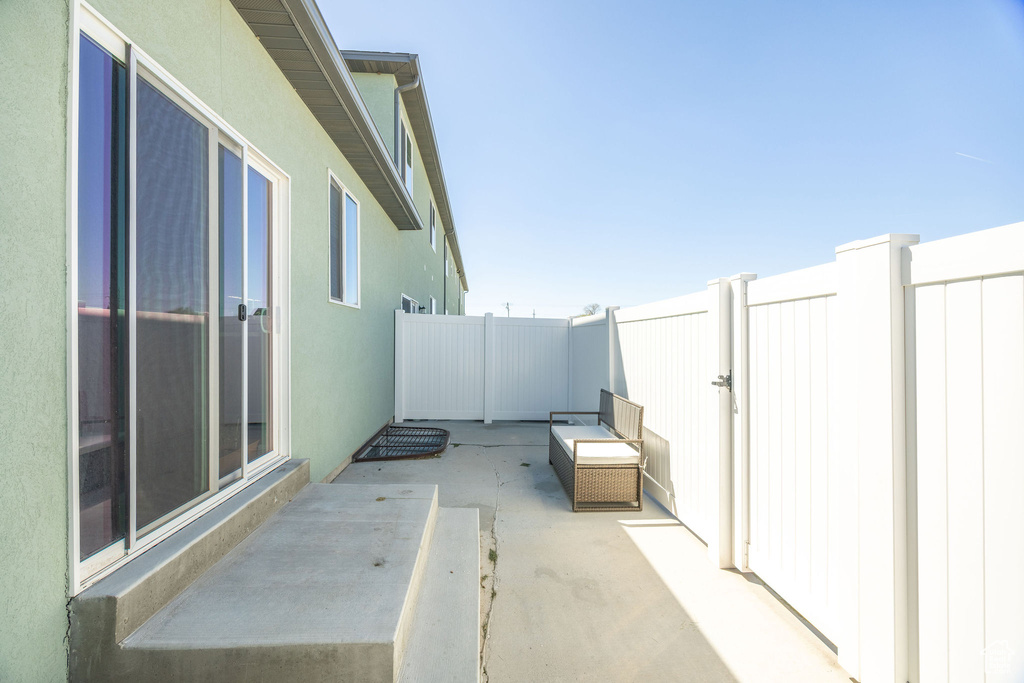 View of patio featuring a fenced backyard