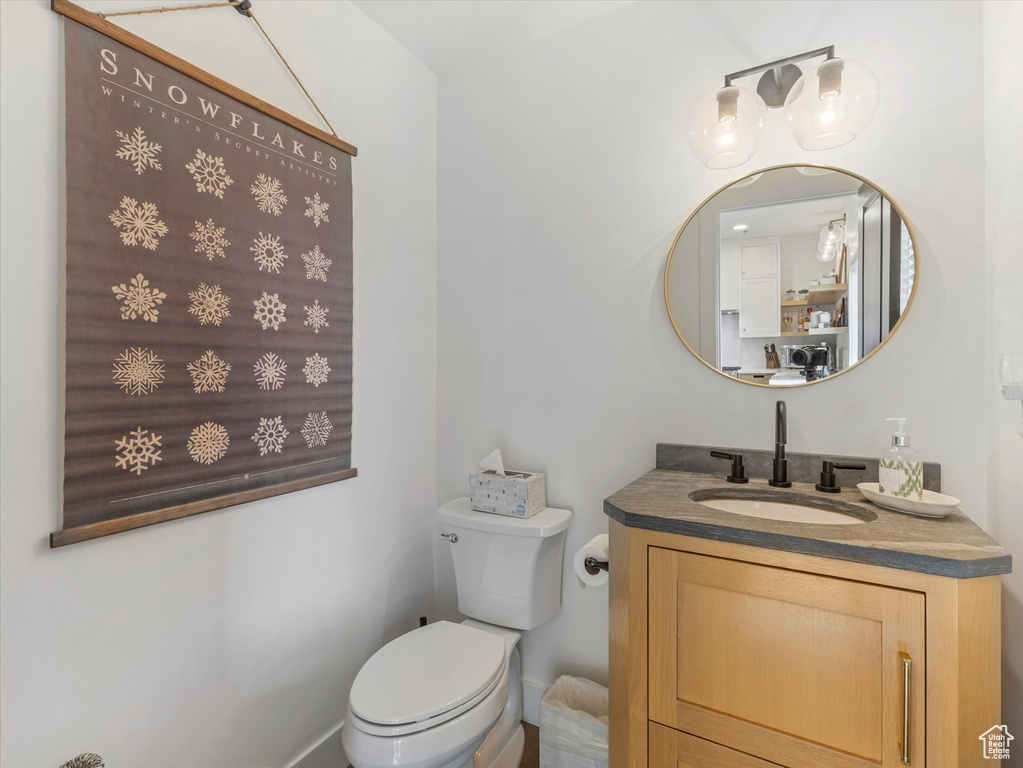 Bathroom with vanity and toilet