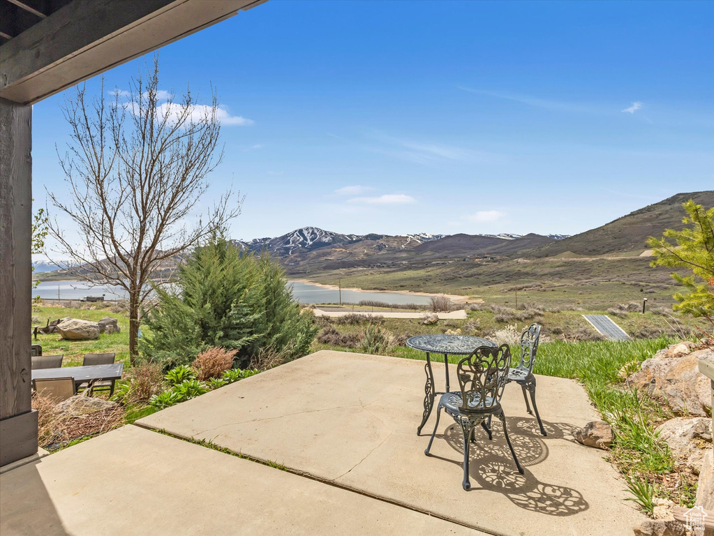 View of patio with a mountain view