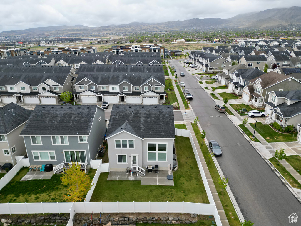 Birds eye view of property featuring a residential view and a mountain view