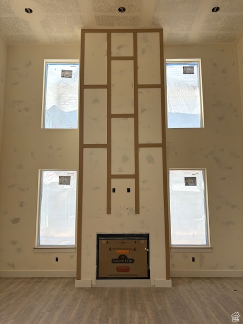 Interior space with baseboards and light wood-type flooring