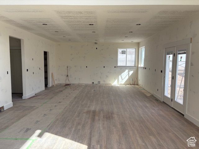 Unfurnished room with wood finished floors