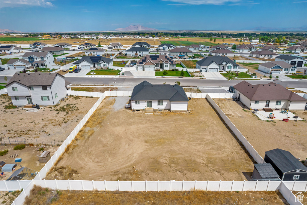 Birds eye view of property with a residential view