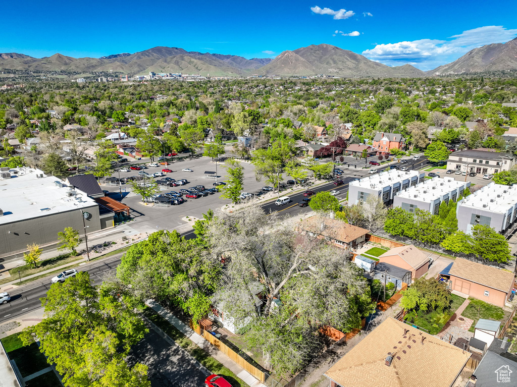 Birds eye view of property with a mountain view
