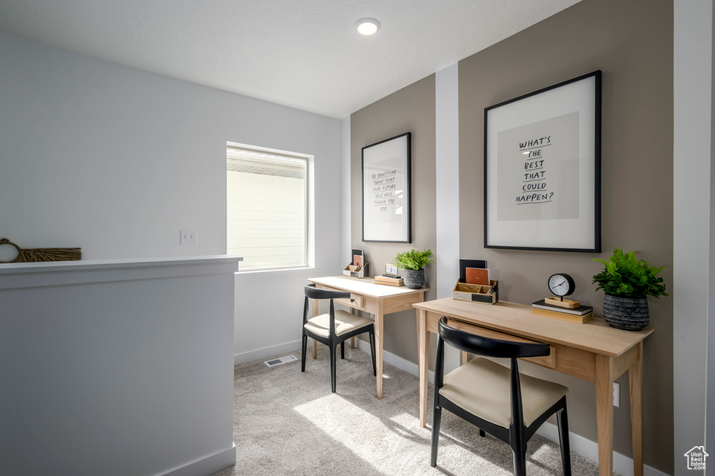 Office featuring baseboards, carpet flooring, and visible vents