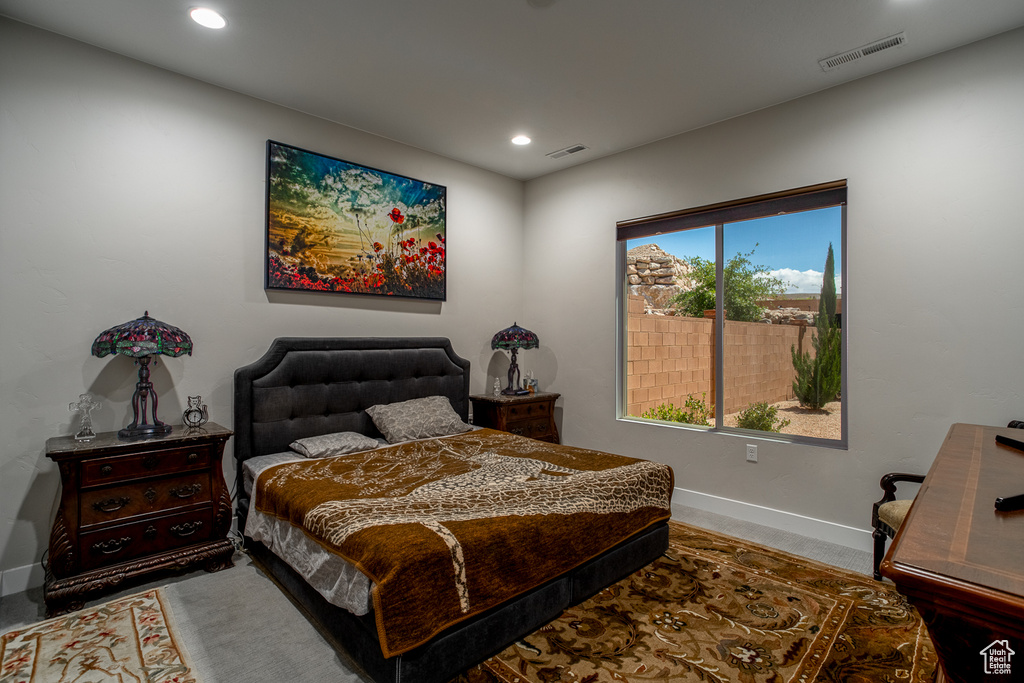 Bedroom with baseboards, recessed lighting, and visible vents