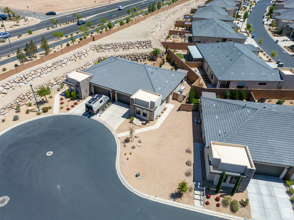 Birds eye view of property with a residential view
