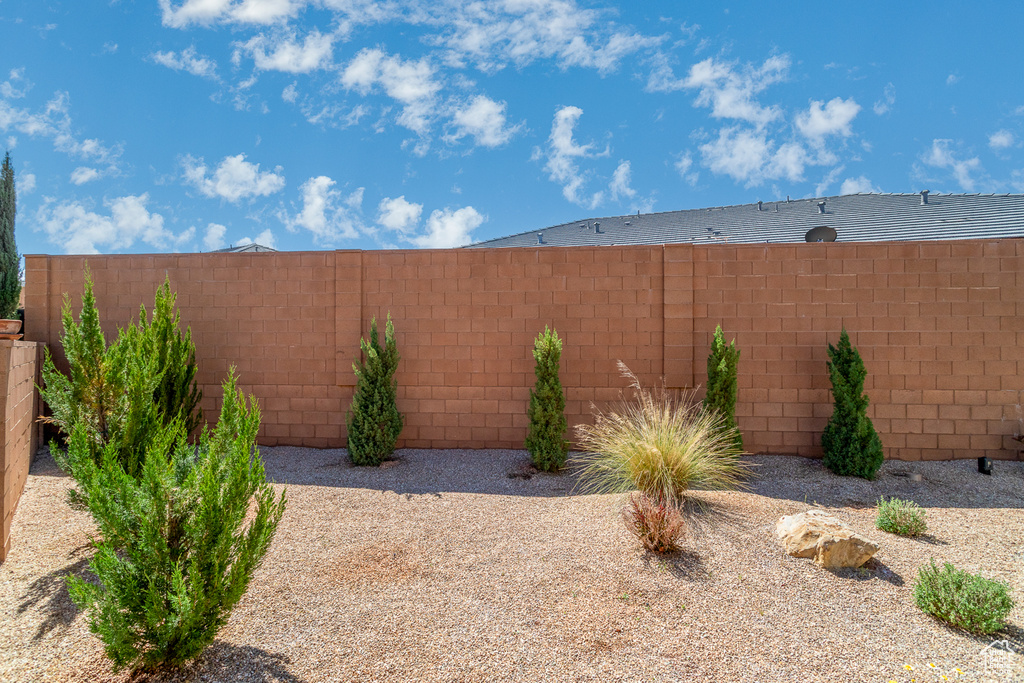 View of yard with a fenced backyard