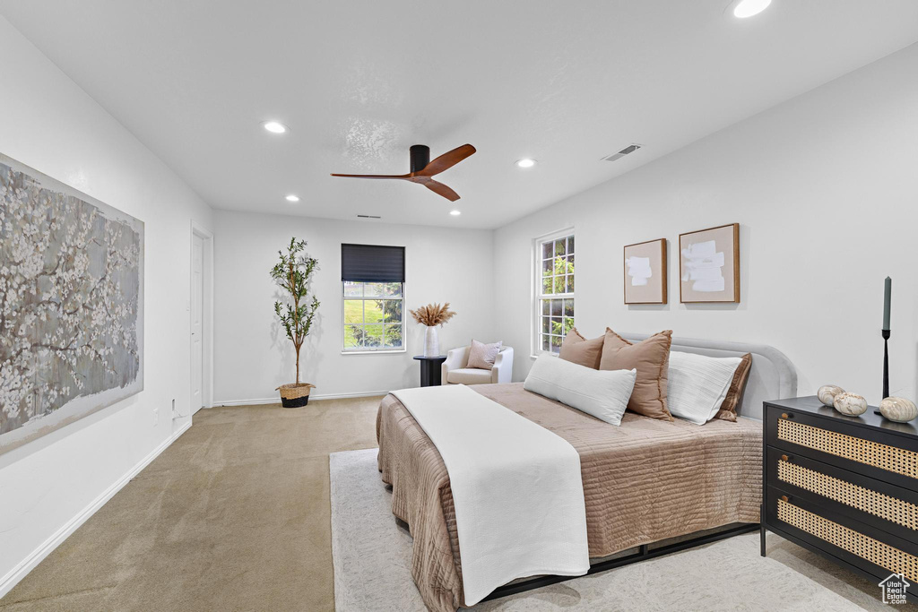 Bedroom with recessed lighting, ceiling fan, visible vents, and carpet