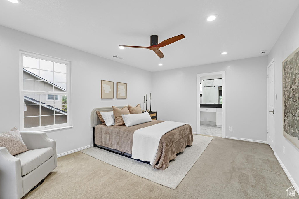 Bedroom with ceiling fan, baseboards, ensuite bathroom, carpet flooring, and recessed lighting