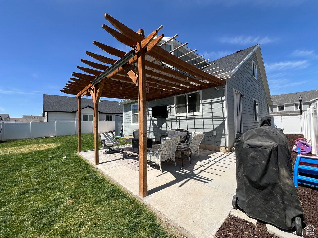 View of patio / terrace featuring a fenced backyard and a pergola