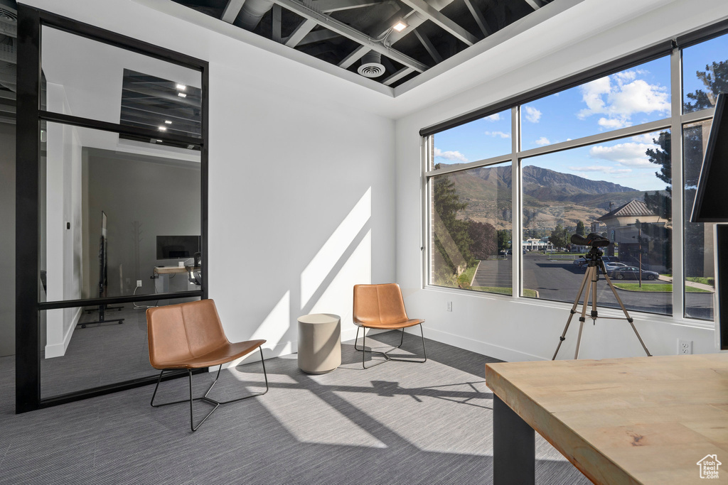 Interior space with baseboards and carpet floors