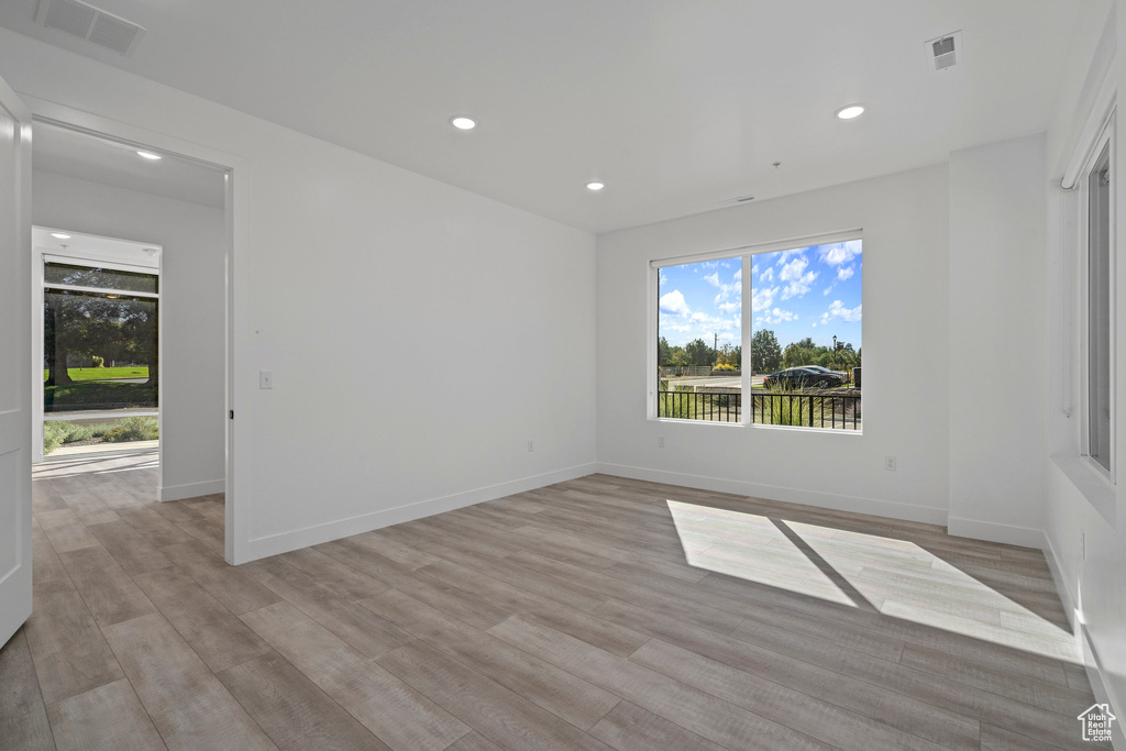 Spare room featuring visible vents, recessed lighting, and light wood finished floors