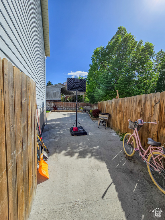 View of patio featuring a fenced backyard