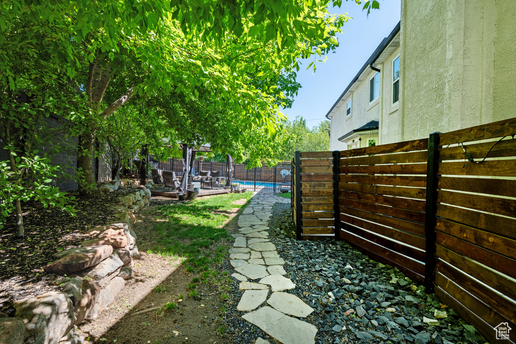 View of fenced backyard